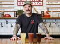 Capital Brewing head brewer Wade Hurley with the ginger beer, cherry cola sour and the blackberry hard lemonade. Picture by Keegan Carroll