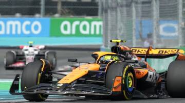 McLaren driver Lando Norris on the way to his maiden Formula One grand prix victory in Miami. (AP PHOTO)