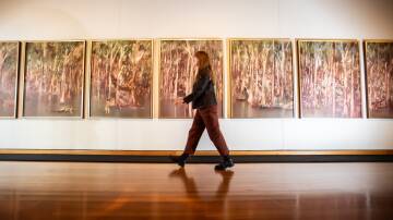 Canberra Museum and Gallery assistant director Rebecca Richards with Sidney Nolan's Riverbend I. Picture by Karleen Minney
