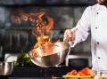 Cooking up a storm in a trendy restaurant in Canberra. Picture by Shutterstock