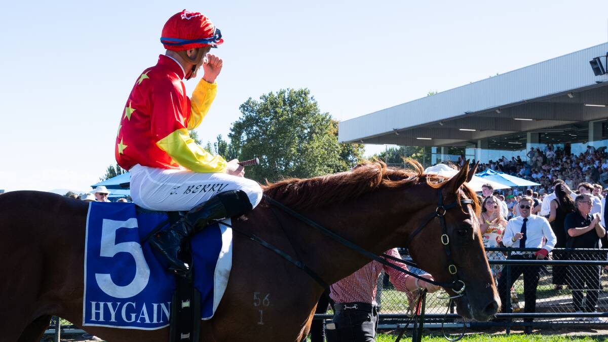 Tommy Berry salutes to the crowd after claiming Sunday's Black Opal. Picture by Elesa Kurtz
