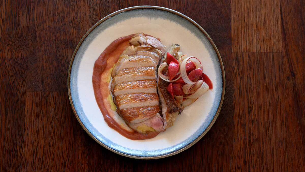 Pork cutlet, rhubarb, Gollion Farm blood plums. Picture by Sitthixay Ditthavong