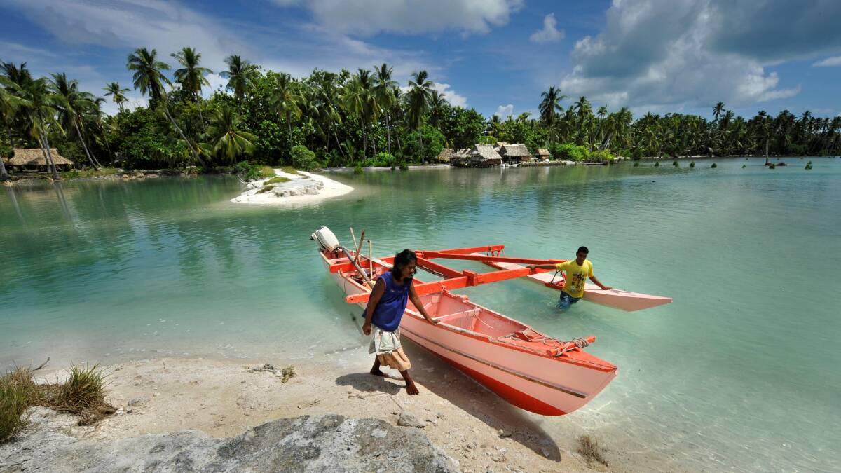 Villagers from Tebunginako, on the Pacific island of Abaiang in Kiribati, have had to relocate because of rising seas. Picture: Justin McManus