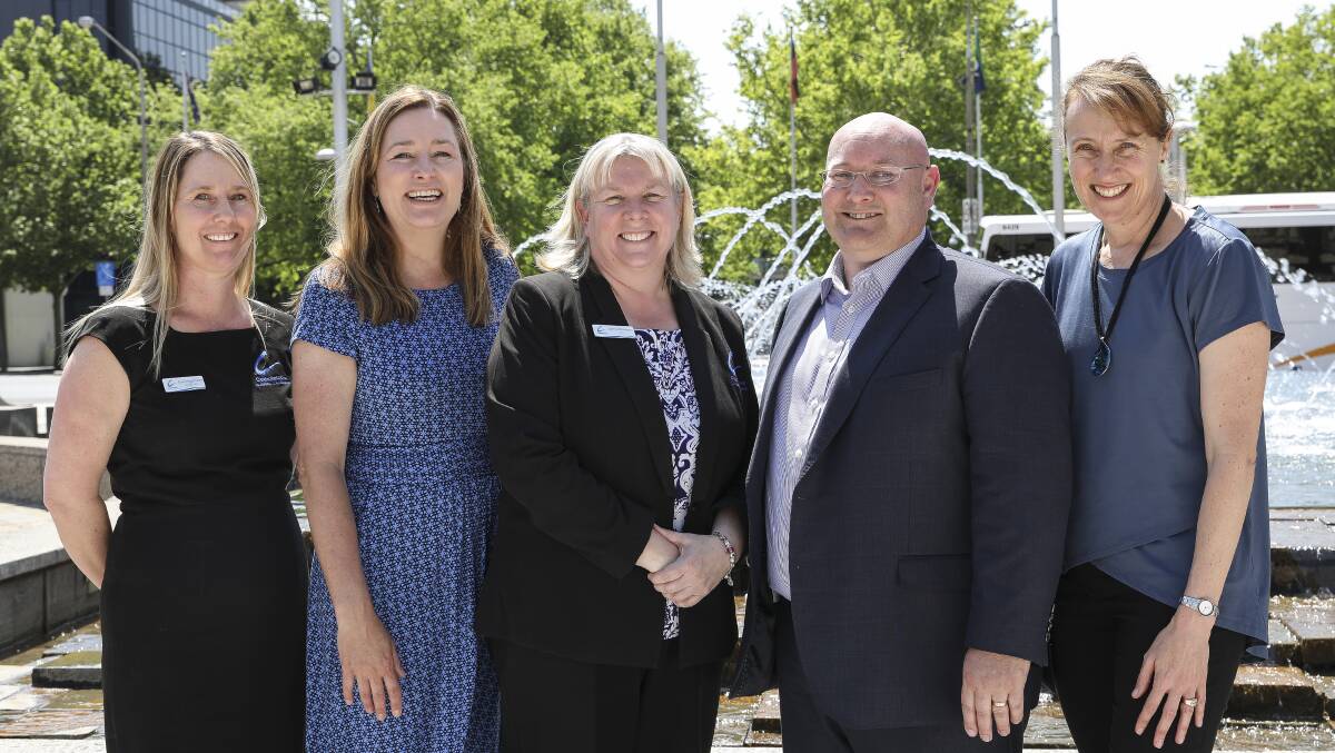 Minister Yvette Berry (second from left) with Housing First partners (from left) Lisa Higginson of Catholic Care, Anne Kirwan of Catholic Care, Patrick McKenna of St Vincent de Paul and Louise Gilding from Housing ACT. Picture: Supplied