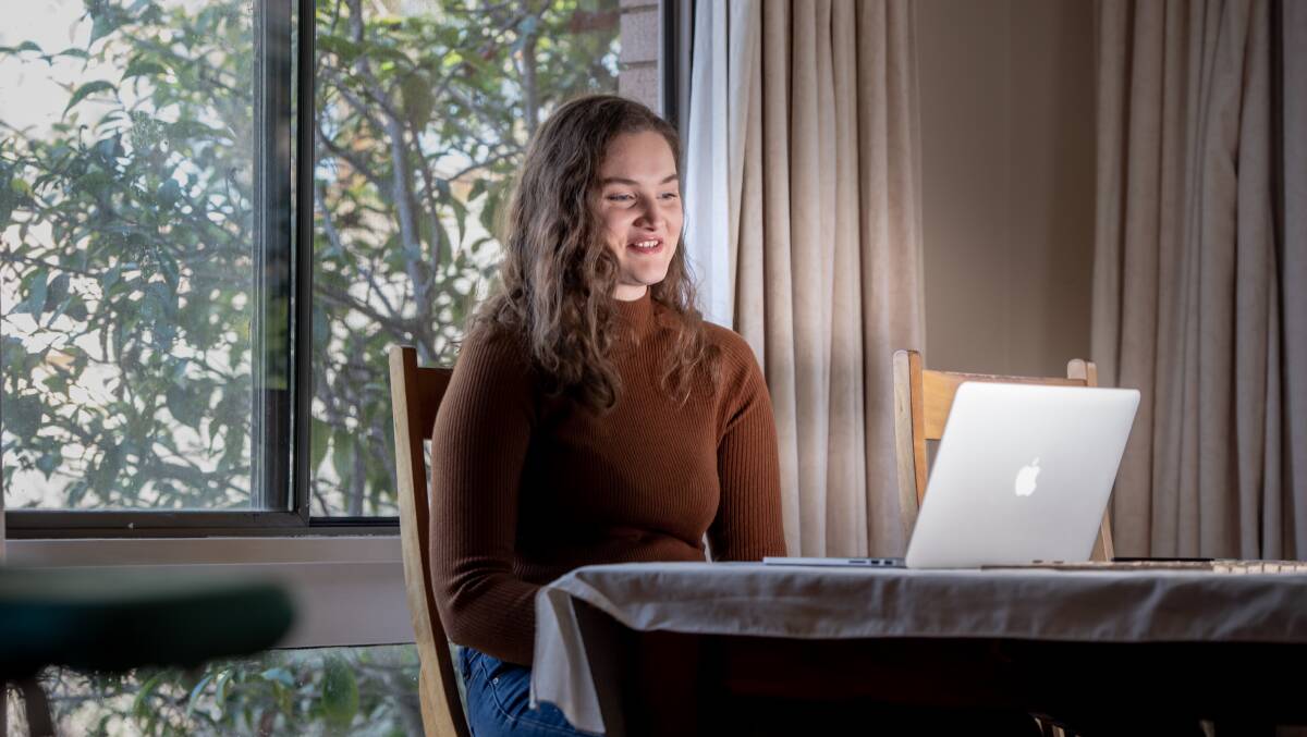 Connections Program volunteer Jessica Donaldson works with socially isolated people. Coffee catch-ups have turned into video calls due to restrictions. Picture: Karleen Minney