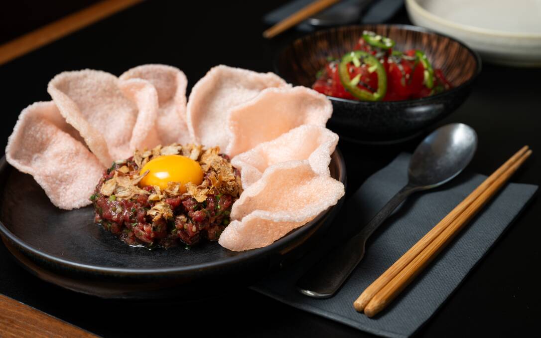 Beef tartare with flavours of pho and prawn crackers with the pressed watermelon salad, shiso, jalapeno, sesame, shallot and ginger. Picture by Elesa Kurtz