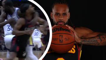 Draymond Green grabs Patty Mills around the neck in a game this week.