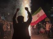 People in Tehran celebrate after Iran's retaliatory strike on Irsael. Picture Getty Images