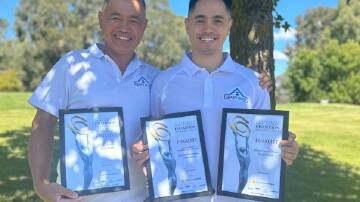 Leaky Roof's Jason and Justin with their most recent local business awards. Picture supplied.