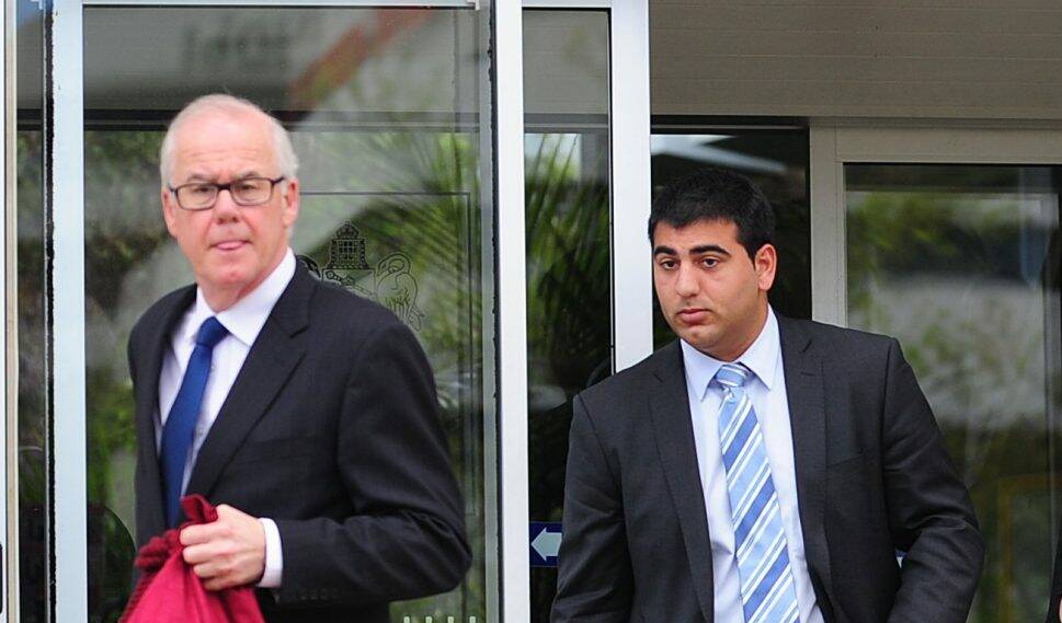 Alexander Iacuone, right, leaves the Supreme Court in Canberra after his sentence hearing in 2013 Photo: Katherine Griffiths