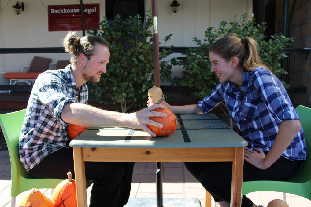 Yoann Tocquet and Charlotte Callander square off over squashes and pumpkins at The Gathering Cafe on Gibraltar Street for the 2018 Bungendore Harvest Festival on March 17 and 18. Photo: Ainsleigh Sheridan