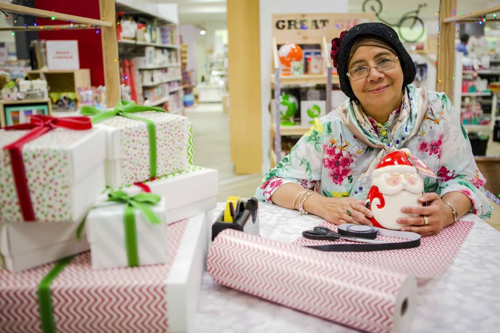 Junaina Jalil is a 58-year-old muslim woman who volunteers for Vision Australia as a gift wrapper at Myer stores, in the lead up to Christmas. Photo: Jamila Toderas