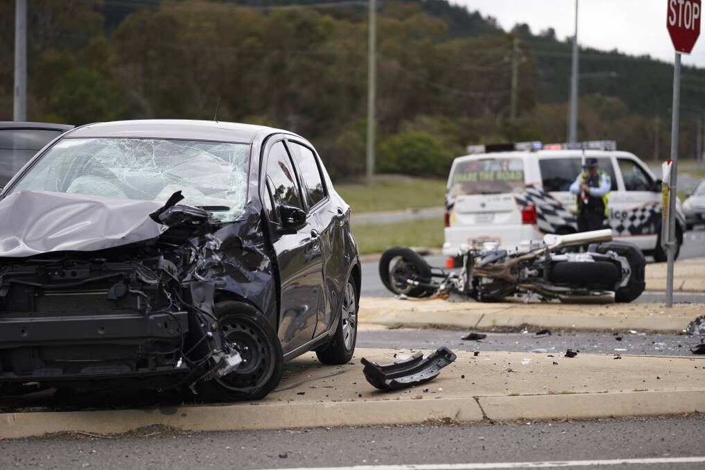 A car and motorbike have collided off Yamba Drive in Farrer on Friday.  Photo: Lawrence Atkin 