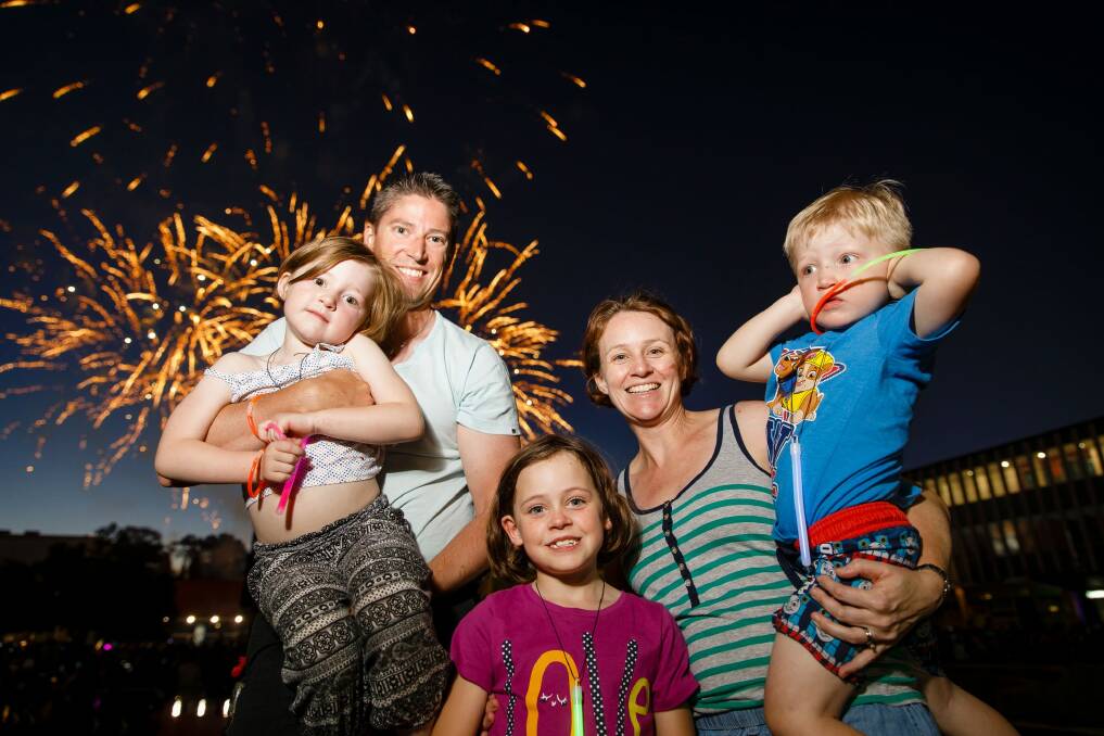David George with wife Kate and their three young children came in from Franklin for the 9pm fireworks. Photo: Sitthixay Ditthavong