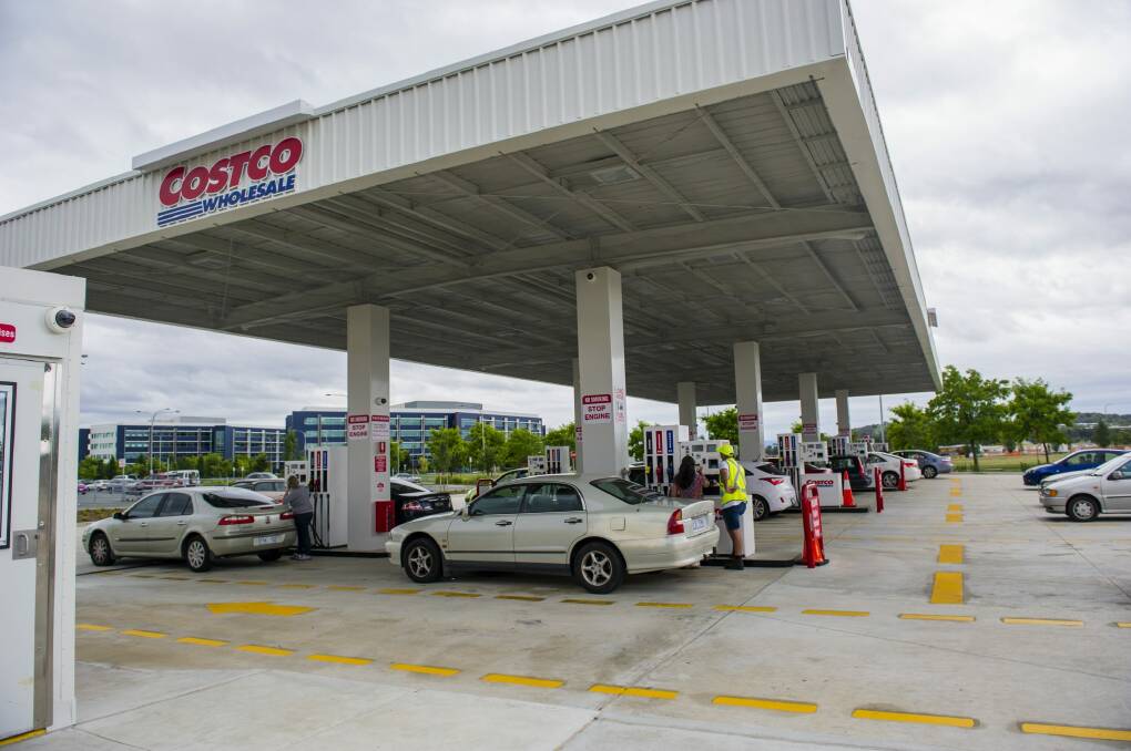Canberra motorists get in for their cheap fuel at Costco Majura Park on Tuesday afternoon. Photo: Jamila Toderas