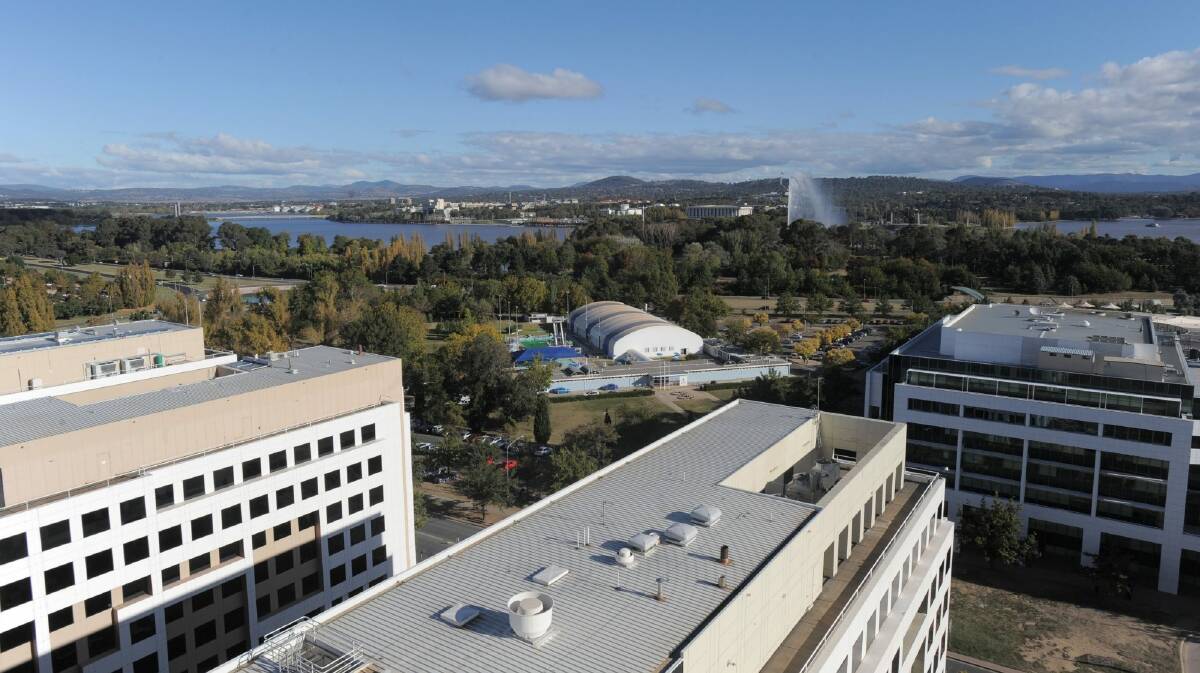 A view of Civic Pool, with Parkes Way and Lake Burley Griffin in the background. Photo: Graham Tidy