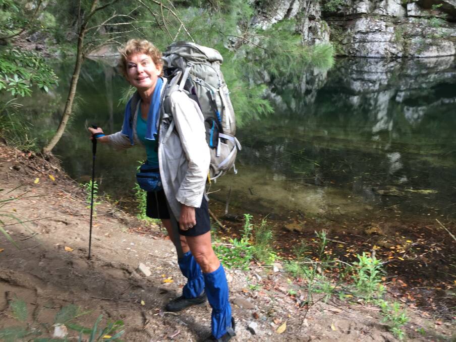 Francisca Boterhoven De Haan, with a black eye after slipping on a rock, in front of a creek during her hike in Morton National Park. Photo: Supplied