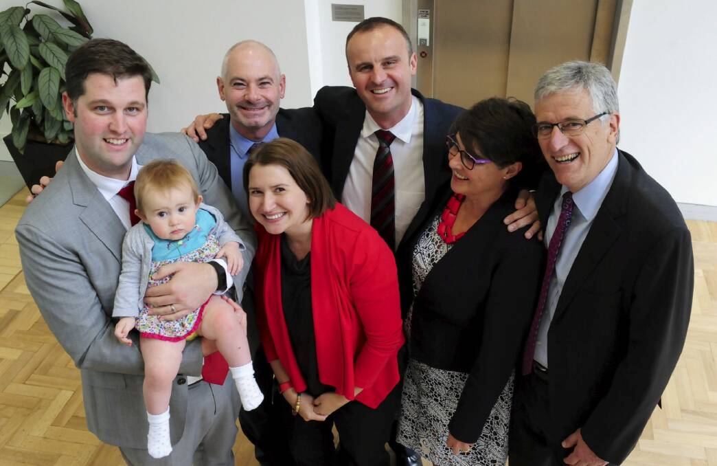 Andrew Barr pictured with partner Anthony Toms, brother and sister in law Iain and Natalie Barr with their daughter Zoe and Andrew’s parents Susan and James Barr.  Photo: Graham Tidy