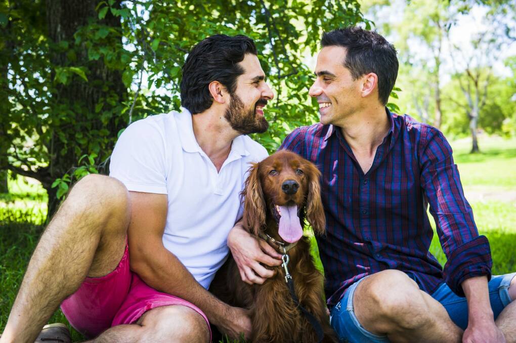 Paul Eldon, left, and his fiance Dan Sanderson with their dog Max. The couple plan to marry at the British High Commission in March. Photo: Jamila Toderas 