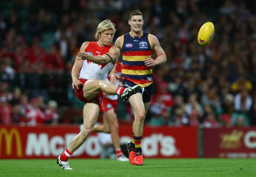 Isaac Heeney, of the Swans, looks upfield during the first semi-final match against the Adelaide Crows on Saturday night. Photo: Ryan Pierse