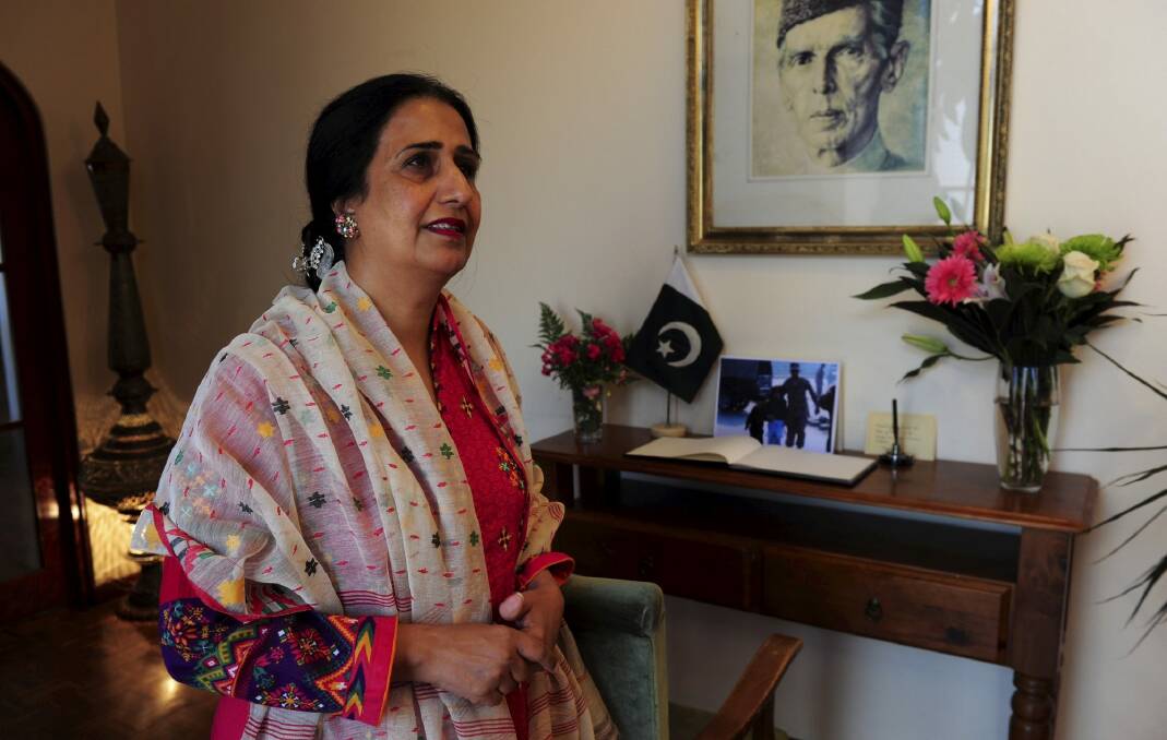 Pakistan High Commissioner to Australia, Naela Chohan was moved to tears as Canberra school children delivered flowers. Photo: Graham Tidy
