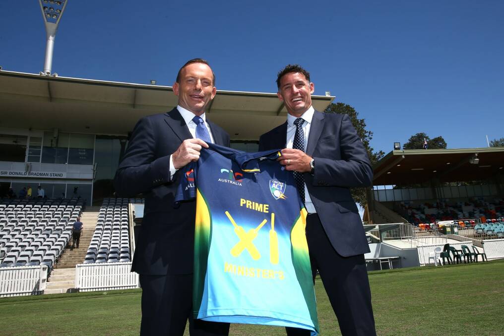 Prime Minister Tony Abbott announces that Michael Hussey will captain the Prime Minister's XI in January. Photo: Jay Cronan