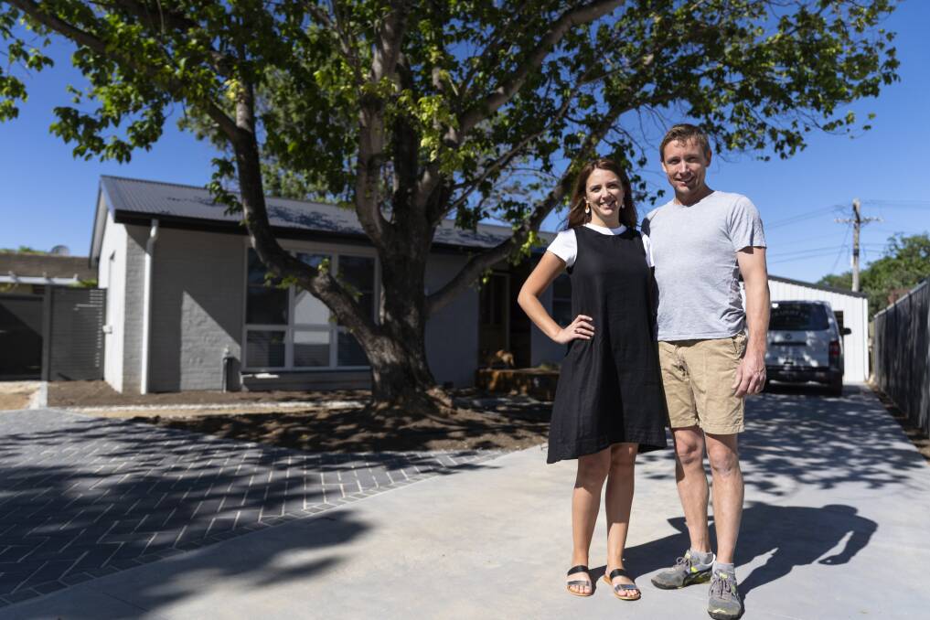 Jessica Evans and James Douglas at the Ainslie home they made their own. Photo: Lawrence Atkin