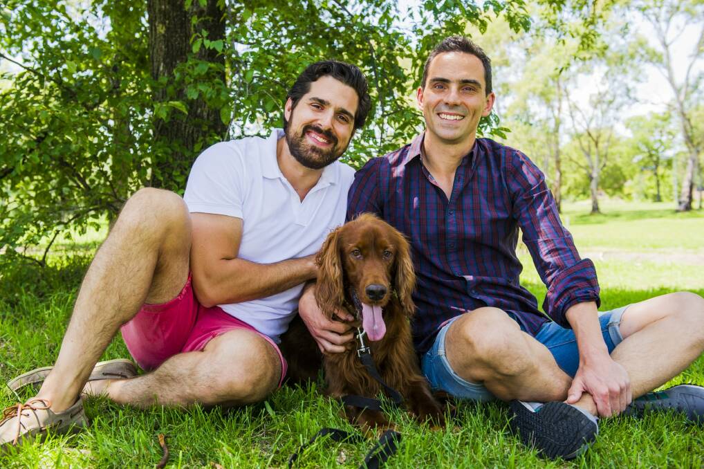 Paul Eldon, left, and his fiance Dan Sanderson with their dog Max. The couple plan to marry at the British High Commission in March. Photo: Jamila Toderas