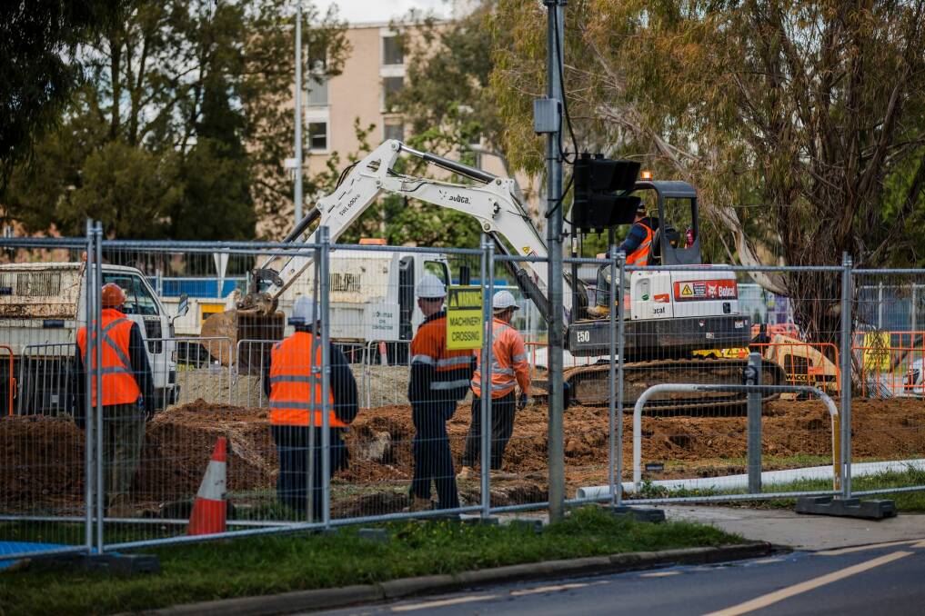 Construction workers on Northbourne Avenue as part of the light rail project. Photo: Jamila Toderas
