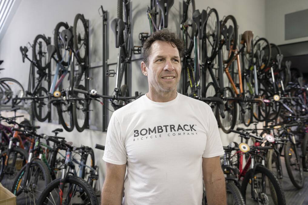 Lonsdale St Cyclery owner John Ross, pictured above, said a lack of carparking spaces in the area hurt local businesses. Photo: Sitthixay Ditthavong