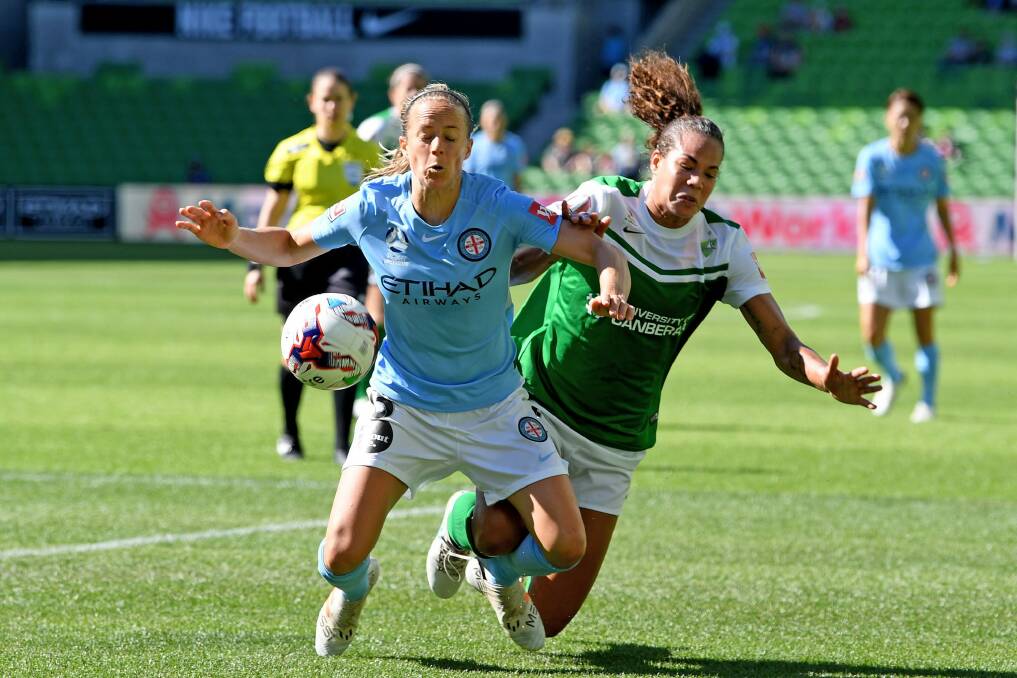 Aivi Luik of City (left) and Toni Pressley of United clash, during the round 7 W-League match between Melbourne City and Canberra United. Photo: AAP