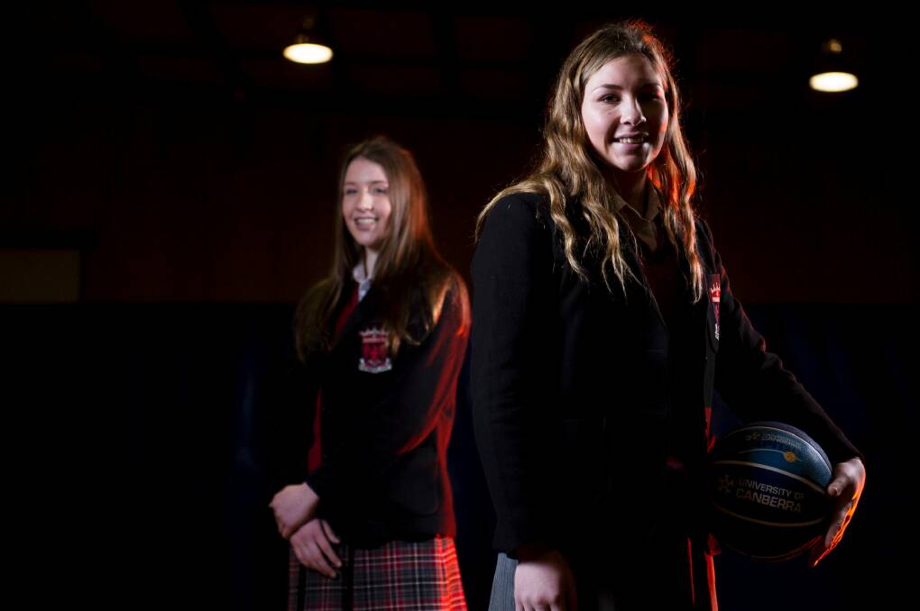 Canberra Capitals have signed sisters Callie (right) and Issie Bourne. Photo: Jay Cronan