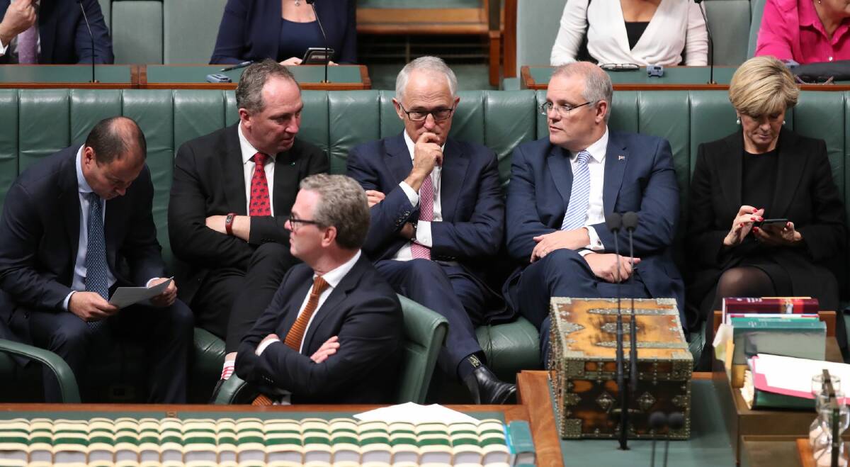 Waiting game: Prime Minister Malcolm Turnbull with frontbenchers Josh Frydenberg, Barnaby Joyce, Christopher Pyne, Scott Morrison and Julie Bishop in the House of Representatives on Friday. Photo: Andrew Meares