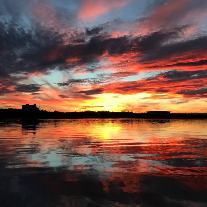 A photo of a sunset over Lake Burley Griffin by Tom Cumming was one of Visit Canberra's most popular Instagram images in 2016. Photo: Tom Cumming / Supplied