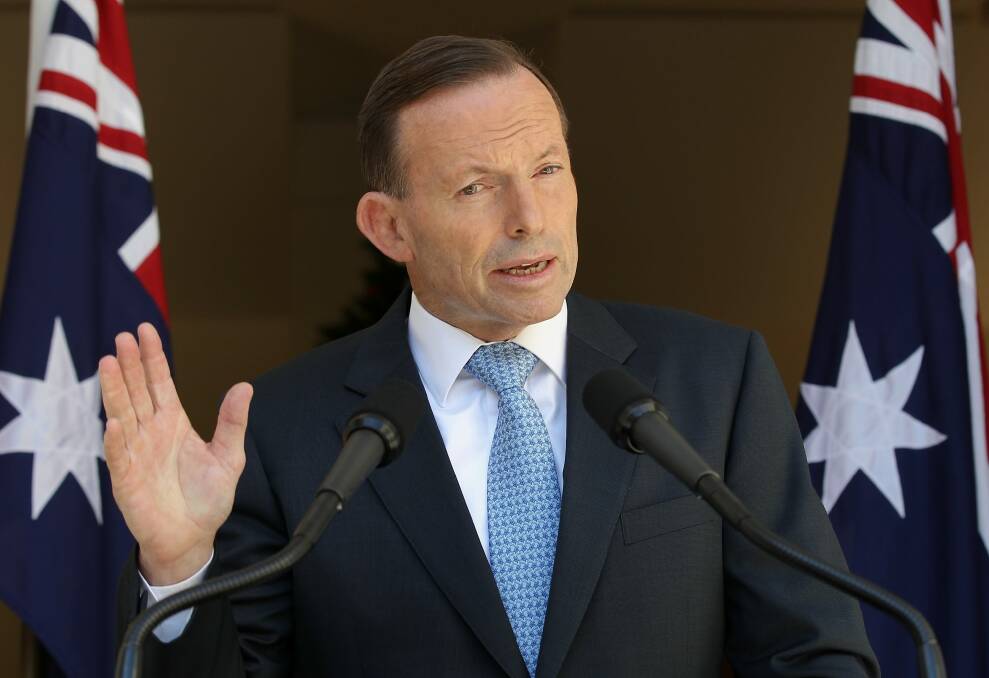 Prime Minister Tony Abbott will spend the weekend pondering a frontbench reshuffle. Photo: Alex Ellinghausen