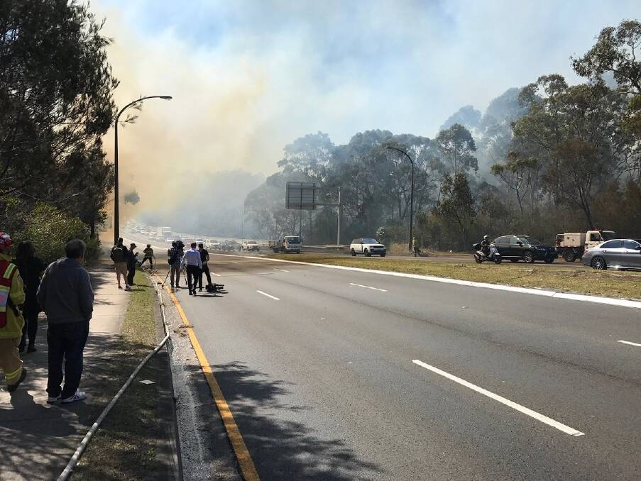 A fire at Macquarie Park has caused traffic delays on Lane Cove Road. Photo: Twitter: @LiveTrafficSyd