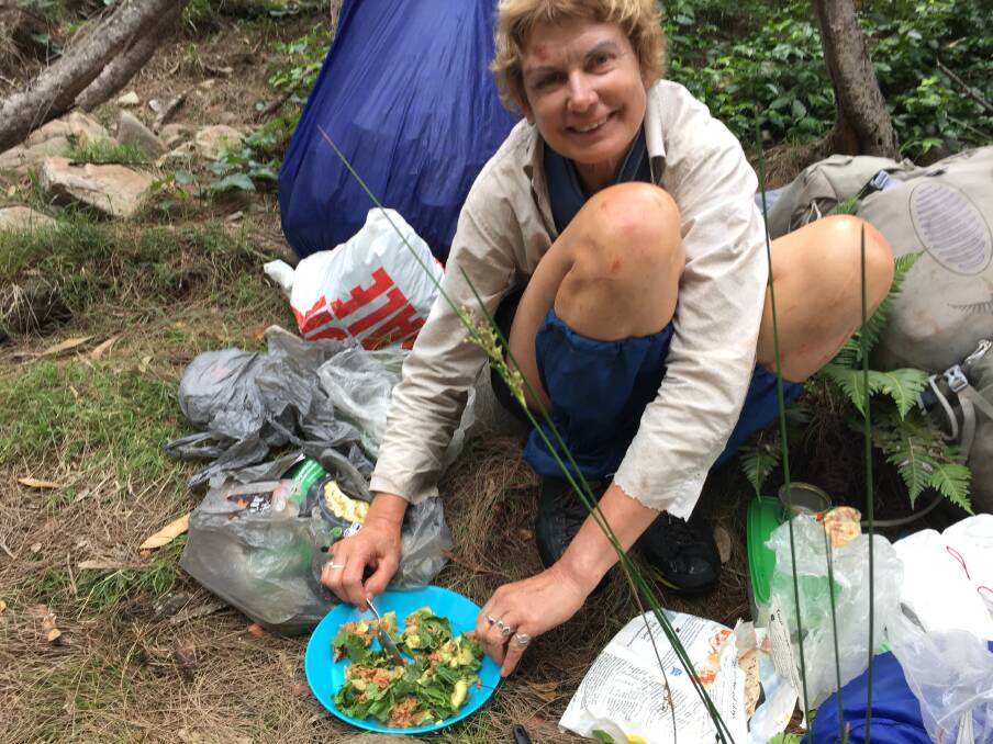 Francisca Boterhoven De Haan has a meal at a campsite she and William McCarthy set up during their six nights in Morton National Park. Photo: Supplied