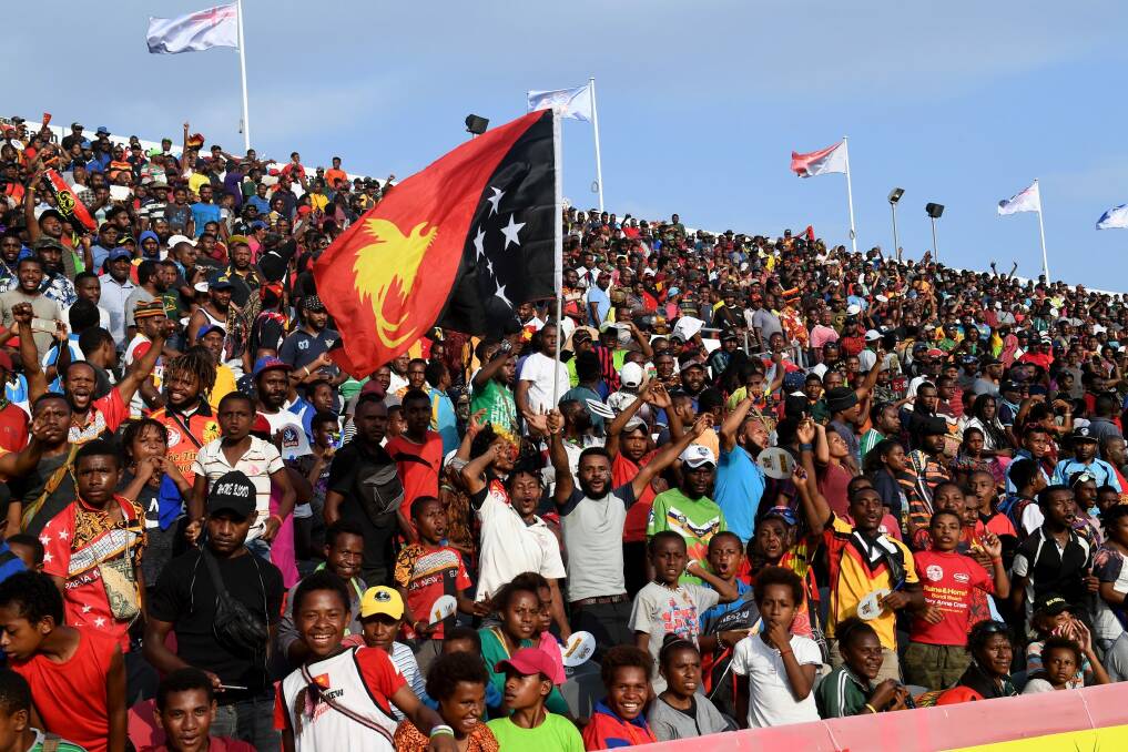 Pumped: A boisterous home crowd enjoys the occasion in Port Moresby Photo: NRL Photos
