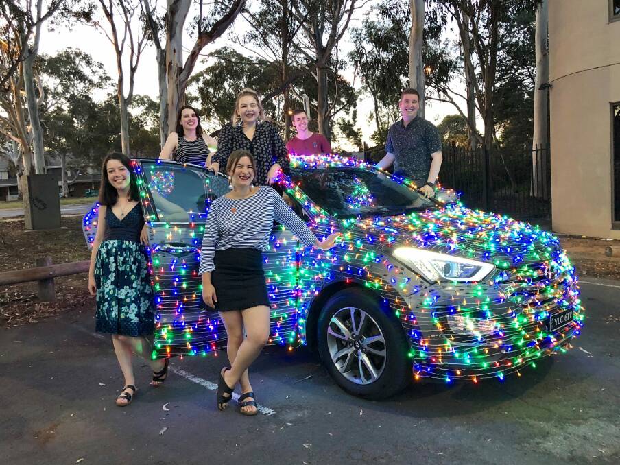 The Christmas car and creators. From left to right it is: Courtney Tanner, Fern Boultan, Jasmine Fenyvesi, Morgan Jacobs, James Perkins, Jordan Wallace. Not pictured is Sophie Cousins, Meg Beatty, Natalie Harper, Briana Jones and Sarah Smith Photo: Supplied