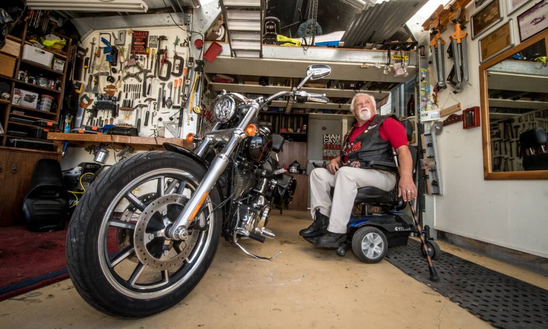 Disabled pensioner and former firefighter Alan Francis of Symonston, who parked his motorbike at the Canberra Hospital recently in a 3-hour disabled spot for an appointment and left his sticker on the bike. He returned to a $600 parking fine.  Photo: Karleen Minney