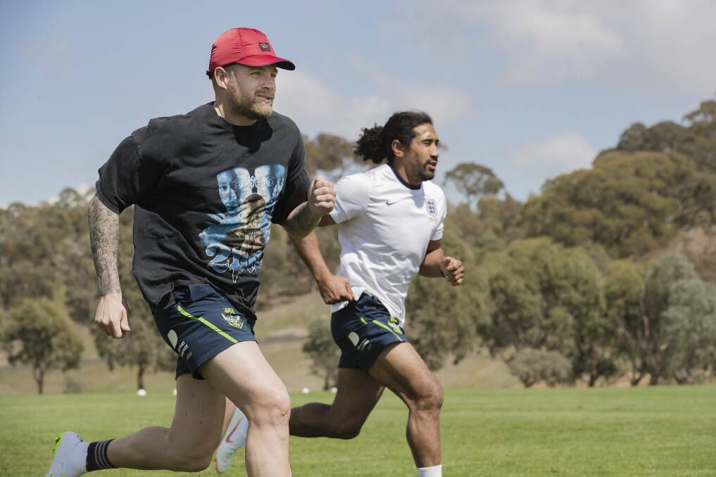 Blake Austin and Sia Soliola in a speed and agility course run by Andrew Heffernan. Photo: Sitthixay Ditthavong