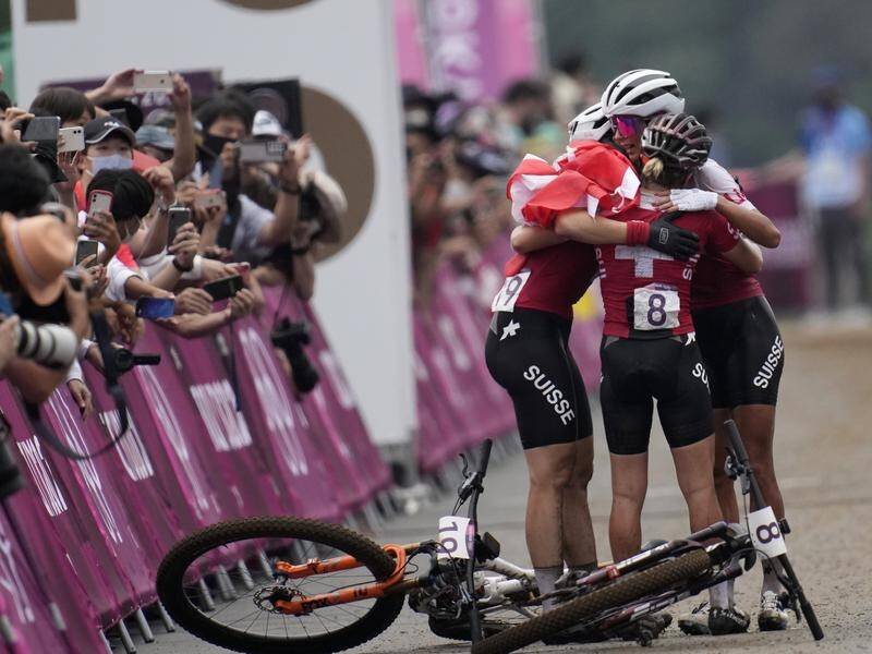 Swiss riders celebrate claiming all three medals in the Olympic women's mountainbike event.