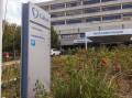 Signs have started to change at North Canberra Hospital but signs of the old Calvary remain. Picture by Keegan Carroll 