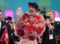 Nemo of Switzerland celebrates his win at the Eurovision Song Contest in Malmo, Sweden. (AP PHOTO)