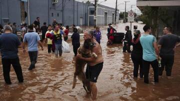 Evacuate continue in Rio Grande do Sul state, Brazil, after a week of heavy rains. (AP PHOTO)