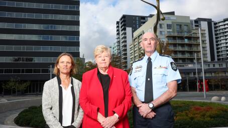 ACT domestic violence and sexual violence coordinator-general Kirsty Windeyer, former Victorian police chief commissioner and the review's leader Christine Nixon and ACT chief police officer Scott Lee. Picture by Sitthixay Ditthavong