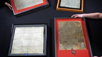 Four documents of the Magna Carta at the British Library in London. (EPA PHOTO)