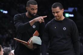 The Charlotte Hornets have named Boston Celtics assistant coach Charles Lee (l) as their new mentor. (AP PHOTO)