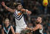 Ex-Melbourne player Luke Jackson (left) is making a big impression in the ruck for the Dockers. (Michael Errey/AAP PHOTOS)