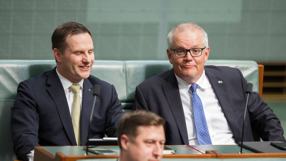 Former prime minister Scott Morrison is rumoured to be preparing his exit from Parliament, leaving behind his seat next to co-conspirator, Alex Hawke. Picture by Sitthixay Ditthavong